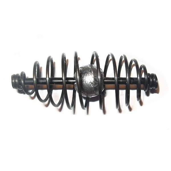 Годівниця пружина з вантажем Фотографія